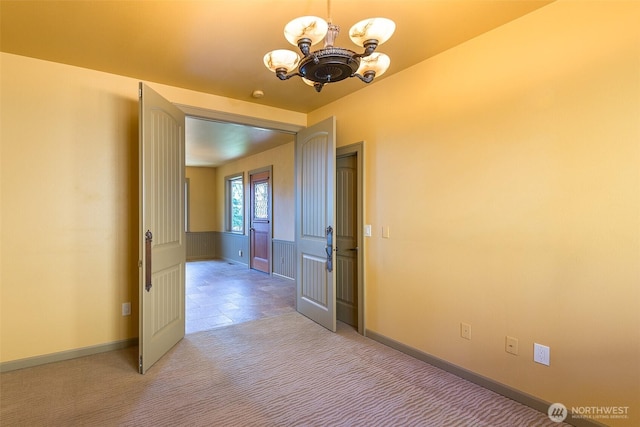 822 E Oak St, Sequim, WA 98382 - hall with a chandelier and light colored carpet