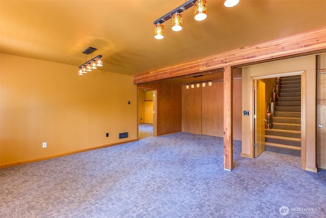 822 E Oak St, Sequim, WA 98382 - unfurnished living room featuring carpet floors and stairway