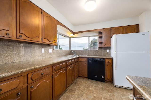1411 38th St, Anacortes, WA 98221 - kitchen with freestanding refrigerator, dishwasher, brown cabinets, open shelves, and backsplash