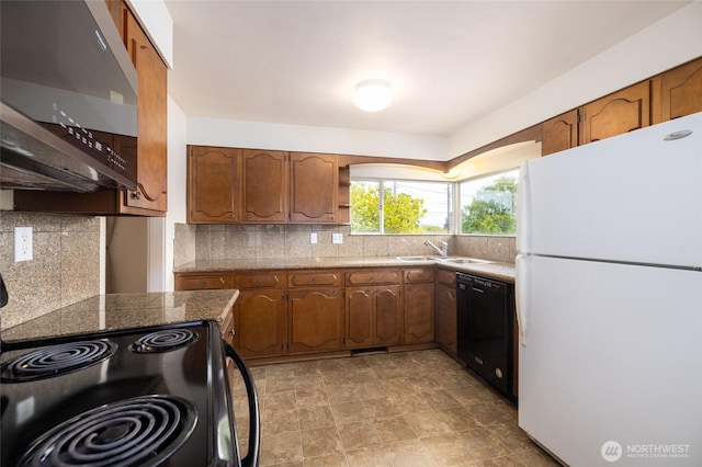 1411 38th St, Anacortes, WA 98221 - kitchen with black appliances, brown cabinets, open shelves, and tasteful backsplash