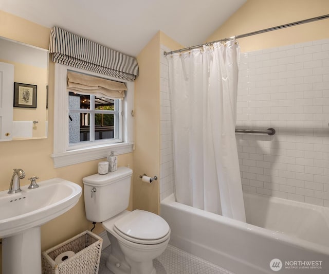 1617 Federal Ave E, Seattle, WA 98102 - full bathroom featuring shower / bath combo with shower curtain, lofted ceiling, and tile patterned flooring
