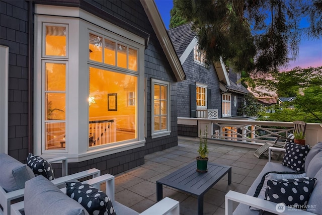 1617 Federal Ave E, Seattle, WA 98102 - patio terrace at dusk featuring a patio area