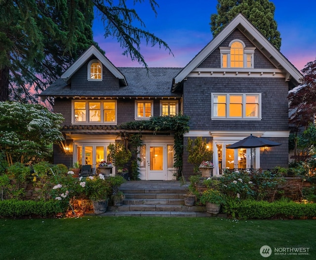 1617 Federal Ave E, Seattle, WA 98102 - view of front facade with a front lawn and french doors