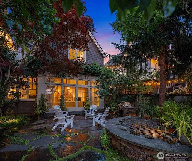 1617 Federal Ave E, Seattle, WA 98102 - back of property featuring french doors and a patio area