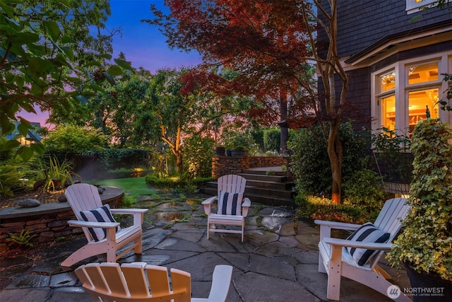 1617 Federal Ave E, Seattle, WA 98102 - patio terrace at dusk with a patio