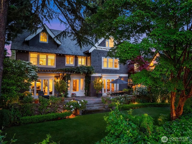 1617 Federal Ave E, Seattle, WA 98102 - rear view of house featuring a patio and a yard