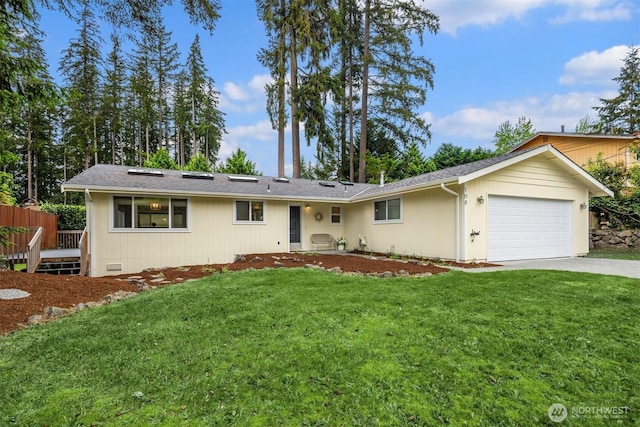 108 151st Pl SE, Lynnwood, WA 98087 - single story home featuring an attached garage, concrete driveway, a front lawn, and a wooden deck