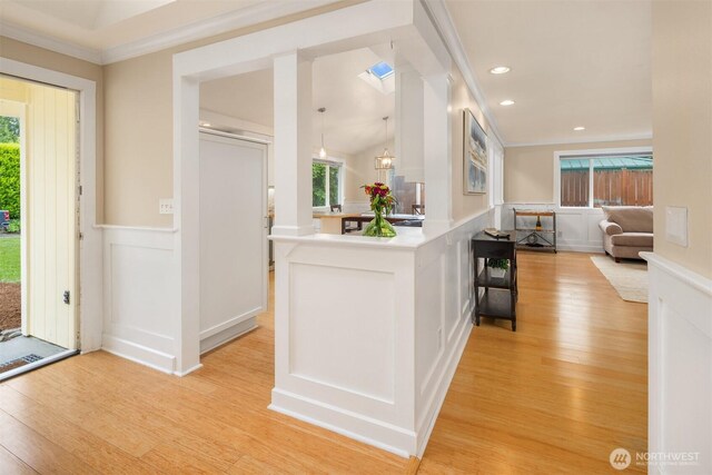 108 151st Pl SE, Lynnwood, WA 98087 - entryway featuring a decorative wall, light wood-type flooring, wainscoting, ornamental molding, and recessed lighting