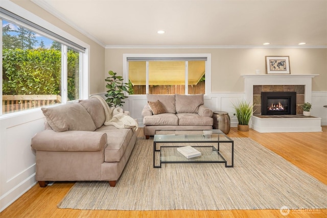 108 151st Pl SE, Lynnwood, WA 98087 - living area with wood finished floors, a fireplace, and ornamental molding