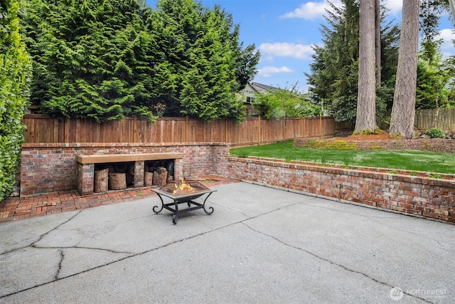 108 151st Pl SE, Lynnwood, WA 98087 - view of patio / terrace with a fire pit