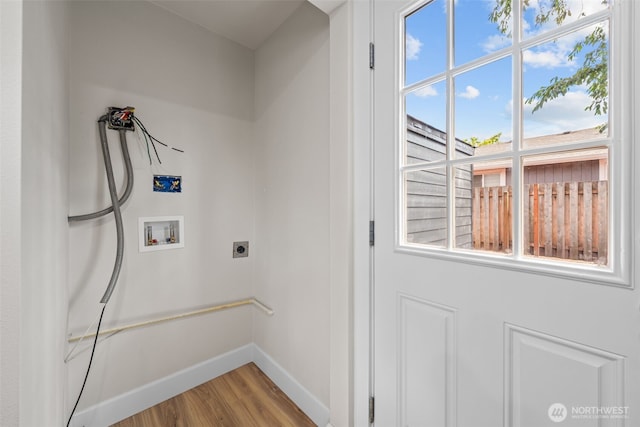 6416 S Huson St, Tacoma, WA 98409 - washroom featuring hookup for a washing machine, electric dryer hookup, wood finished floors, and healthy amount of natural light