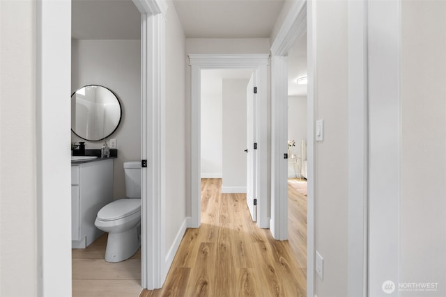 6416 S Huson St, Tacoma, WA 98409 - half bath with wood finished floors and vanity