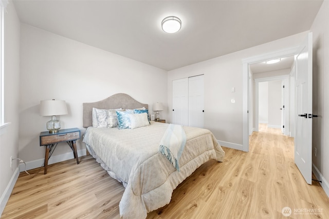 6416 S Huson St, Tacoma, WA 98409 - bedroom with light wood-type flooring and a closet