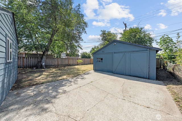 6416 S Huson St, Tacoma, WA 98409 - detached garage featuring a storage unit