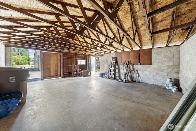 6416 S Huson St, Tacoma, WA 98409 - garage featuring concrete block wall