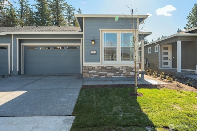 21725 SE 292 Nd Pl, Black Diamond, WA 98010 - view of front of property featuring concrete driveway, a garage, and a front lawn