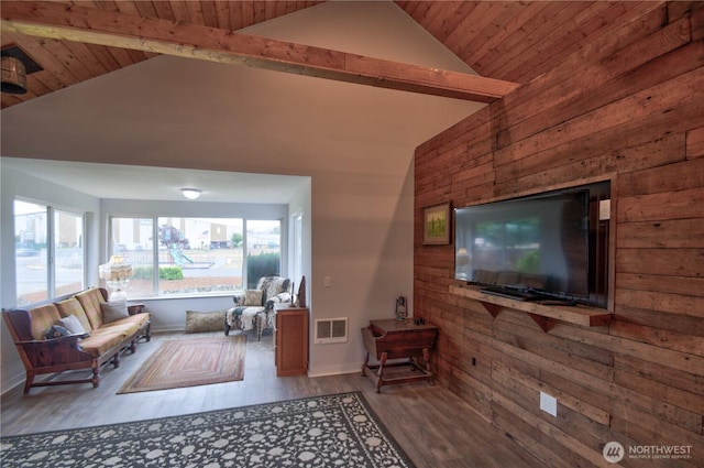 53 E Elma Mccleary Rd, Elma, WA 98514 - living room featuring wood finished floors, wooden walls, a wood ceiling with exposed beams, and high vaulted ceiling
