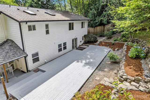 17519 33rd Ave NE, Lake Forest Park, WA 98155 - rear view of house featuring roof with shingles and a deck