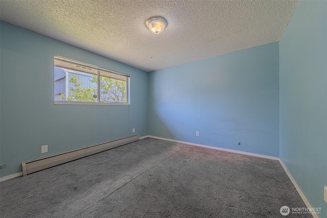 5735 NE 8th St, Renton, WA 98059 - unfurnished room with a baseboard heating unit, carpet floors, and a textured ceiling