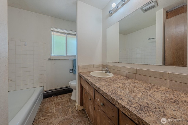 5735 NE 8th St, Renton, WA 98059 - full bath with vanity, stone finish floors, and tasteful backsplash