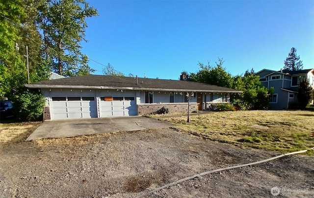 5735 NE 8th St, Renton, WA 98059 - single story home with brick siding, driveway, and a garage