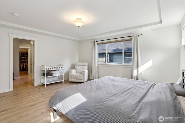 13218 106th Pl NE, Kirkland, WA 98034 - bedroom with wood finished floors and a raised ceiling