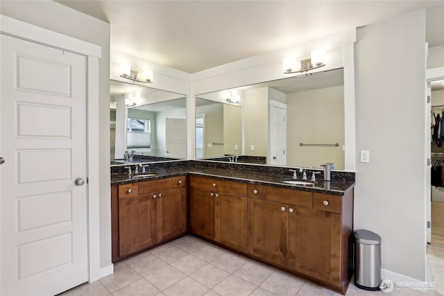 13218 106th Pl NE, Kirkland, WA 98034 - full bath with double vanity, tile patterned floors, and a spacious closet