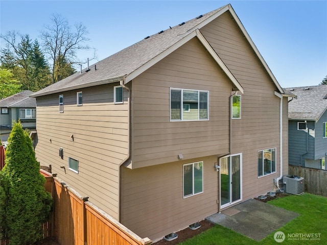 13218 106th Pl NE, Kirkland, WA 98034 - rear view of house with a fenced backyard, a patio, and a shingled roof