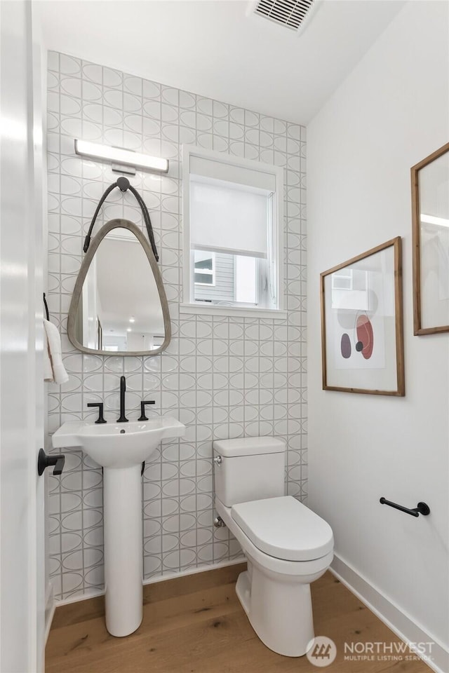 12207 137th Pl NE Unit 2602, Redmond, WA 98052 - bathroom with wood finished floors and toilet