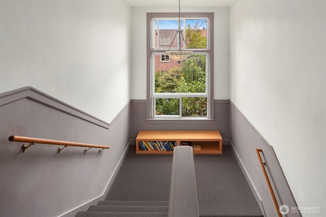 404 E Harrison St Unit 301, Seattle, WA 98102 - staircase with plenty of natural light and carpet
