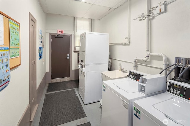 404 E Harrison St Unit 301, Seattle, WA 98102 - communal laundry room with washing machine and clothes dryer and stacked washer / drying machine