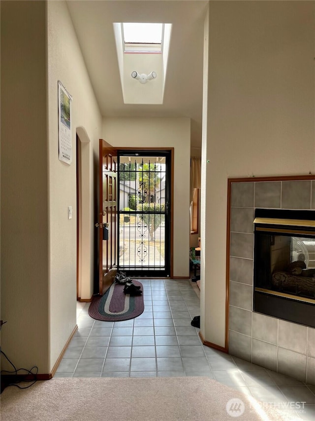 9238 Classic Dr NE, Lacey, WA 98516 - doorway featuring a tiled fireplace and light tile patterned floors
