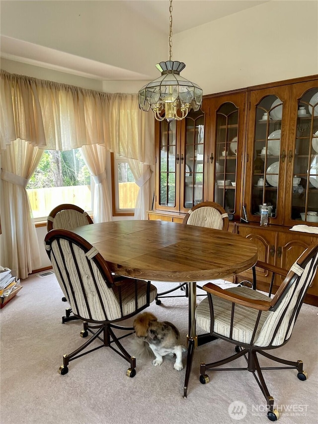 9238 Classic Dr NE, Lacey, WA 98516 - dining space featuring light carpet and a chandelier