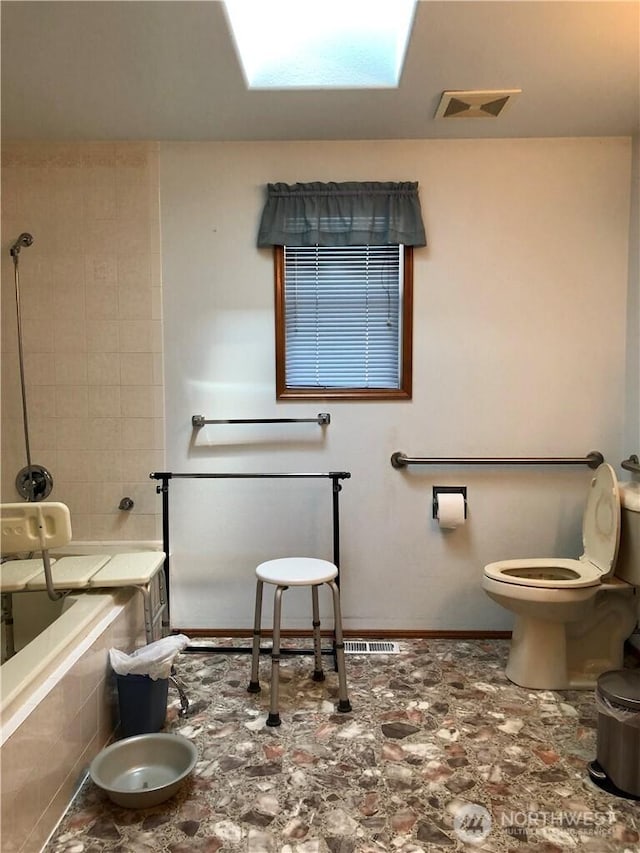 9238 Classic Dr NE, Lacey, WA 98516 - bathroom with toilet and a skylight