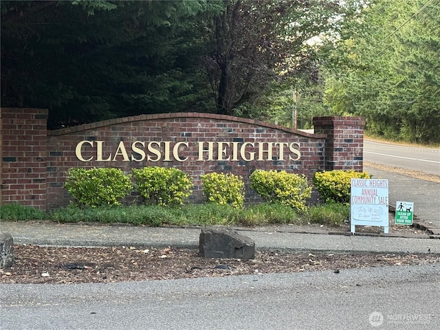 9238 Classic Dr NE, Lacey, WA 98516 - community / neighborhood sign with a forest view