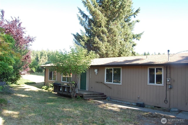 3295 Hastings Ave, Port Townsend, WA 98368 - rear view of property featuring a lawn
