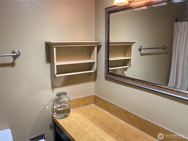 3295 Hastings Ave, Port Townsend, WA 98368 - bathroom featuring a textured wall and vanity