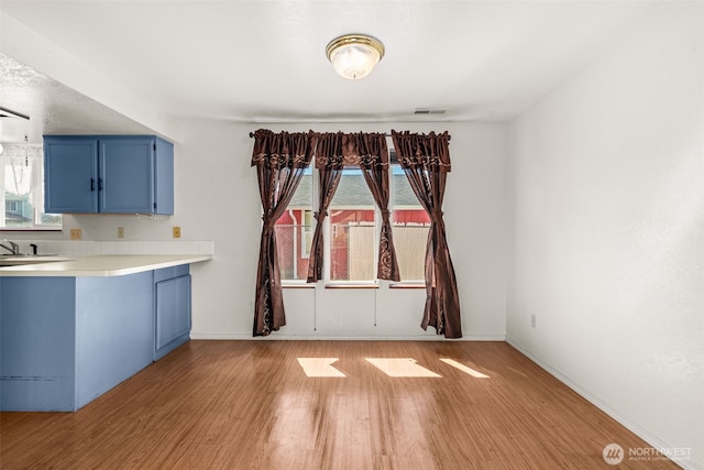 309 SW 6th St, Chehalis, WA 98532 - unfurnished dining area featuring light wood-style flooring and plenty of natural light