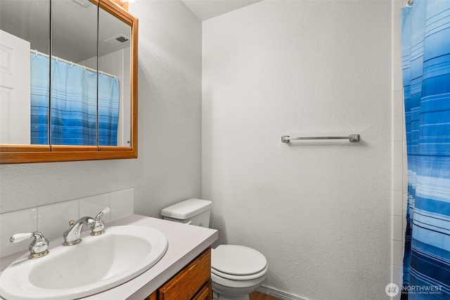 309 SW 6th St, Chehalis, WA 98532 - bathroom featuring vanity, a textured wall, and a shower with shower curtain