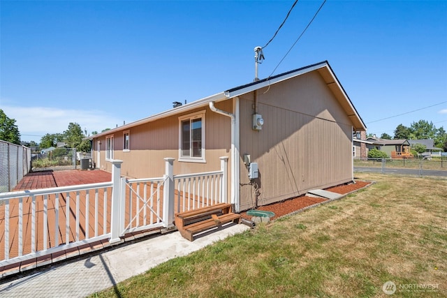 309 SW 6th St, Chehalis, WA 98532 - rear view of property with a fenced backyard and a gate