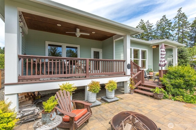 1901 W Hamilton Way, Port Angeles, WA 98363 - view of patio / terrace featuring a fire pit, a ceiling fan, and a deck