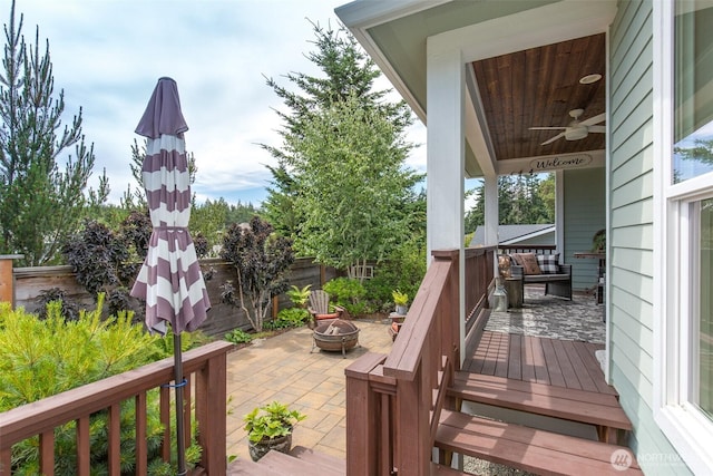 1901 W Hamilton Way, Port Angeles, WA 98363 - wooden terrace featuring a fire pit, ceiling fan, and a patio area