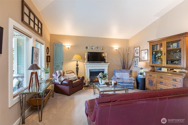 1901 W Hamilton Way, Port Angeles, WA 98363 - living room featuring vaulted ceiling, light carpet, and a premium fireplace