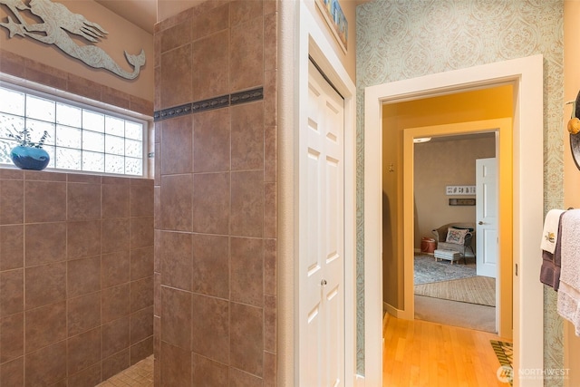 1901 W Hamilton Way, Port Angeles, WA 98363 - bathroom featuring wood finished floors and a tile shower