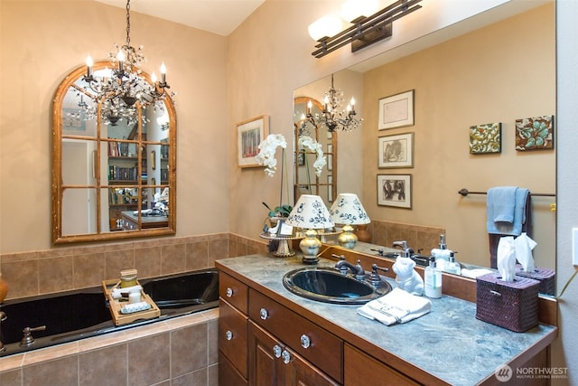 1901 W Hamilton Way, Port Angeles, WA 98363 - bathroom featuring a chandelier, a garden tub, and vanity
