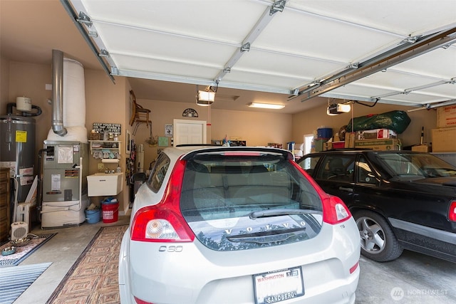 1901 W Hamilton Way, Port Angeles, WA 98363 - garage with a garage door opener and water heater