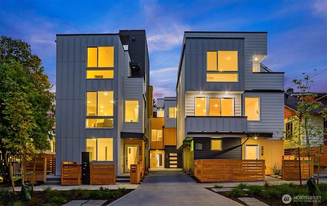 727 18th Ave, Seattle, WA 98122 - modern home with board and batten siding and a fenced front yard