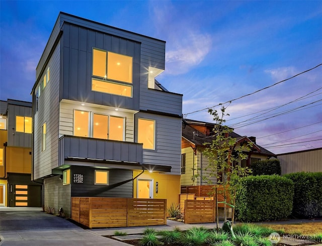 727 18th Ave, Seattle, WA 98122 - contemporary home featuring board and batten siding and concrete driveway
