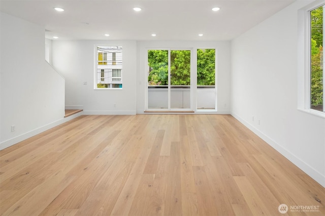 727 18th Ave, Seattle, WA 98122 - spare room featuring plenty of natural light, light wood-style floors, and recessed lighting