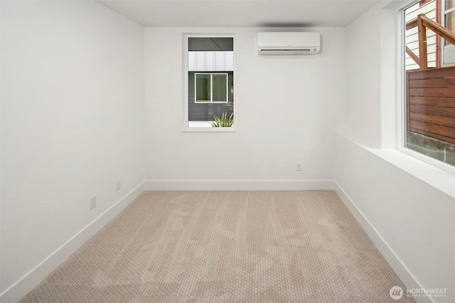 727 18th Ave, Seattle, WA 98122 - carpeted spare room with a wall unit AC and baseboards